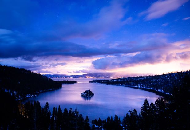 Dark purple and blue clouds, night sky, aerial, Lake Tahoe, California.