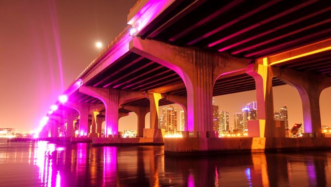 Bridge lit colorfully, nighttime, Miami, Florida.
