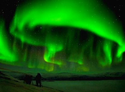 Verdant green northern lights (or aurora borealis) over Abisko, Sweden