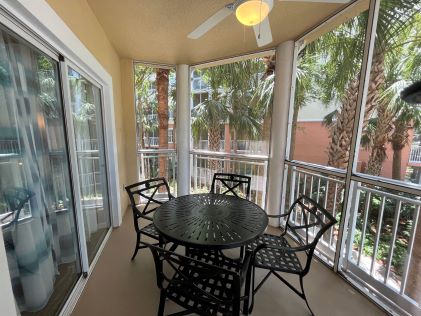 A screened-in patio from a Suite at SeaWorld Orlando, a Hilton Grand Vacations Club