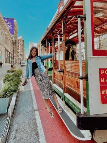 A Hilton Grand Vacations Member on a trolley in San Francisco