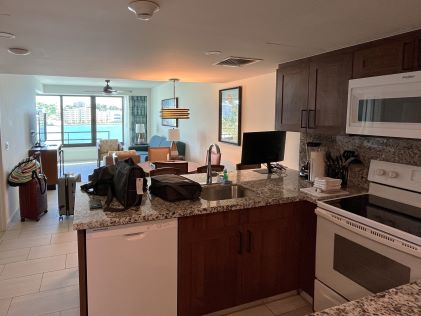 The kitchen and living room of a 2-Bedroom Suite at Royal Palm, a Hilton Vacation Club in Sint Maarten, one of Hilton Grand Vacations' newer locations