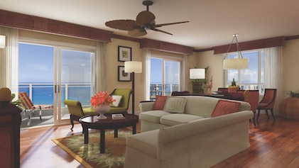 View of the spacious and luxurious living area in a multi-bedroom Suite at Grand Waikikian, a Hilton Grand Vacations Club, Honolulu, Hawaii