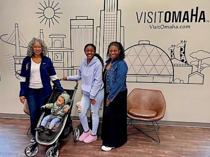 A Hilton Grand Vacations Member travels with her family to Omaha, Nebraska