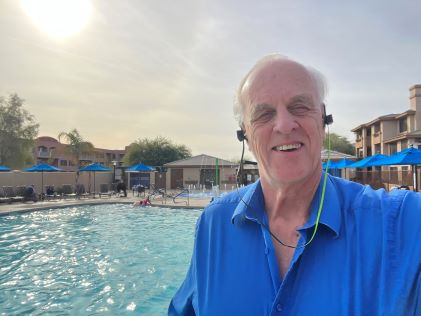 A Hilton Grand Vacations Member at the pool at 1-Bedroom Suite at Scottsdale Links Resort, a Hilton Vacation Club in Arizona