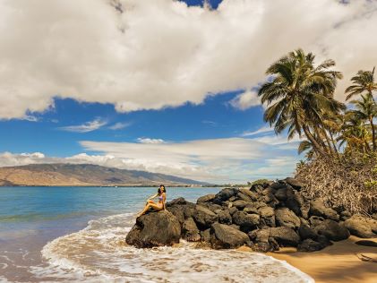 A young woman on the beach in Maui, Hawaii