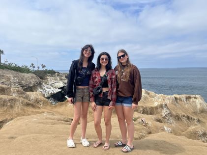 Three teens at the beach in California