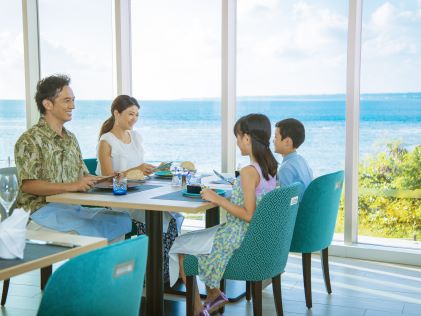 A family dining at one of Hilton's on-site restaurants in Sesoko, Okinawa, Japan