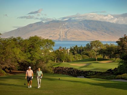 Two golfers on a course in Maui, Hawaii