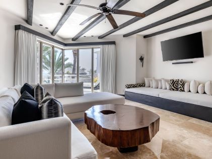 Living area and balcony of a Suite at Cabo Azul, a Hilton Vacation Club in Los Cabos, Mexico