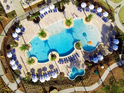 Beautiful aerial image, sparkling blue pool, Ocean Oak Resort, a Hilton Grand Vacations Club, Hilton Head Island, South Carolina. 