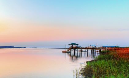 Waterfront view, dock, sunset sky, quiet waterway, Hilton Head, South Carolina. 